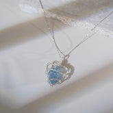Wire-wrapped raw aquamarine gemstone necklace for healing